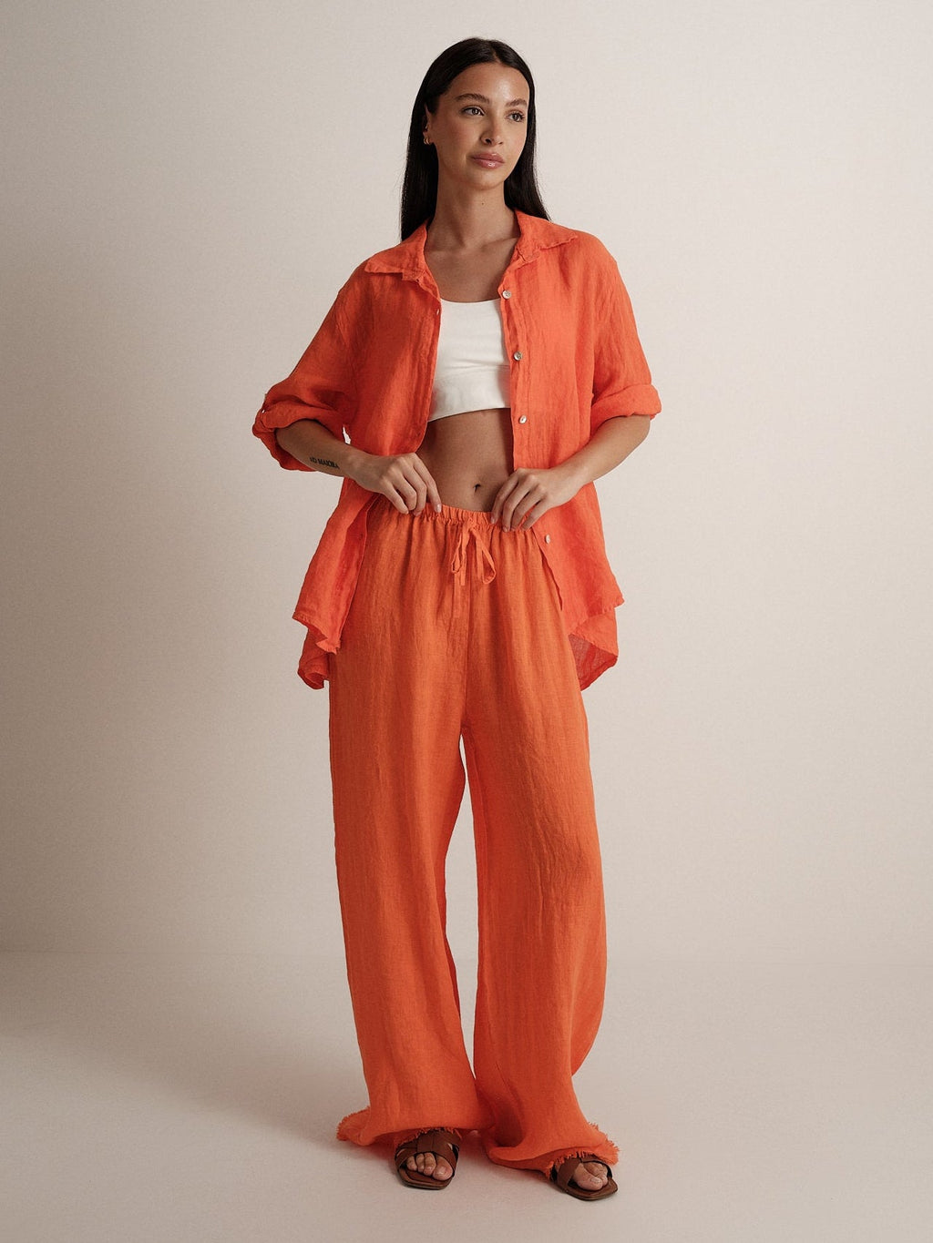 Pantalone in puro lino sfrangiato