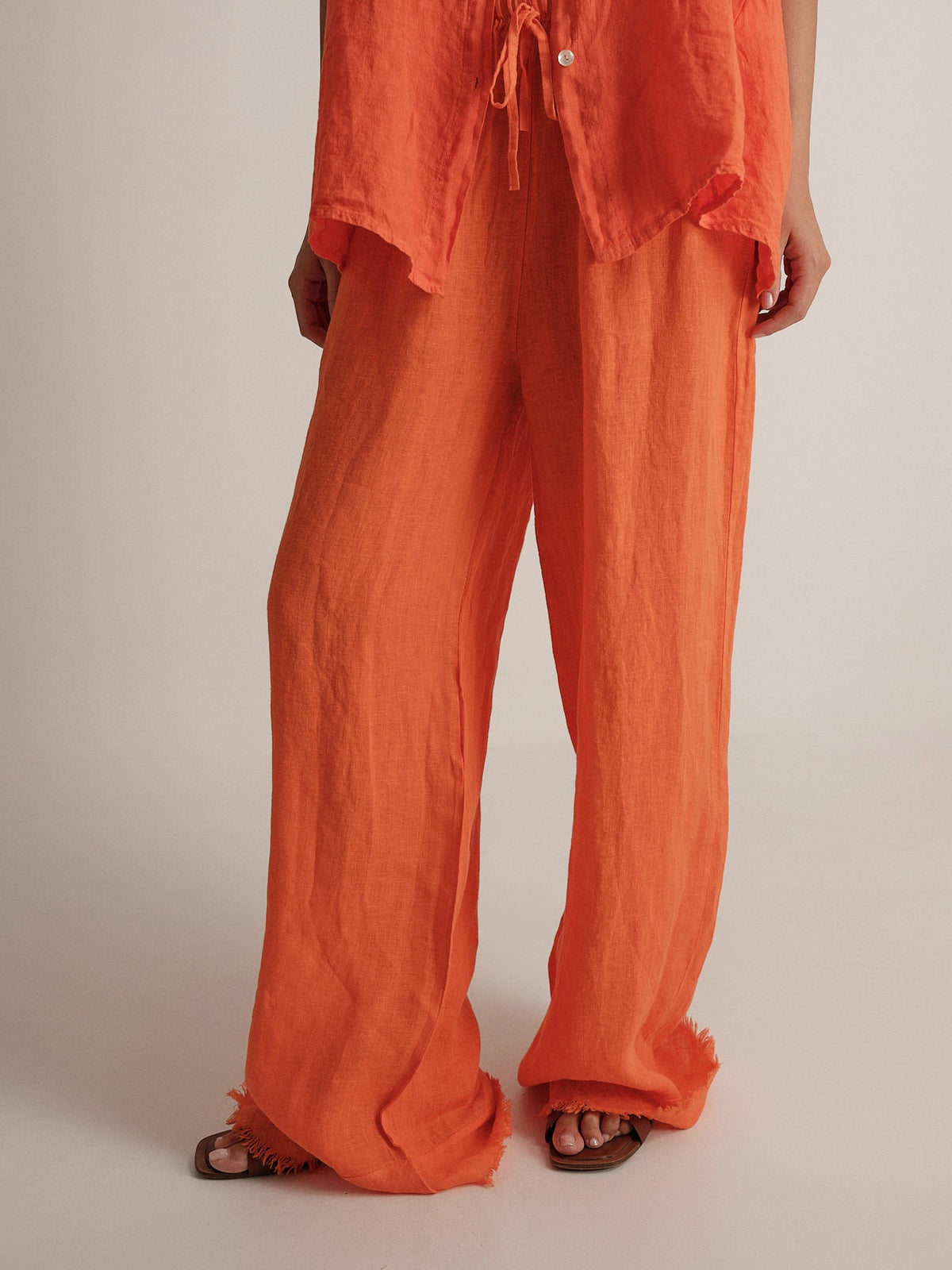 Pantalone in puro lino sfrangiato