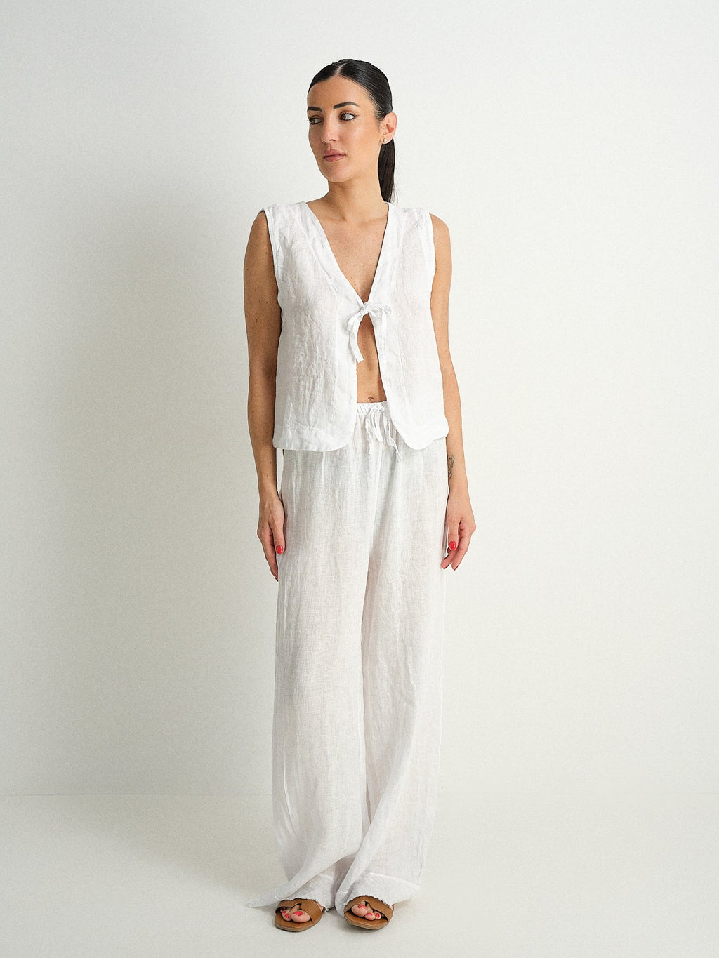 Pantalone in puro lino sfrangiato