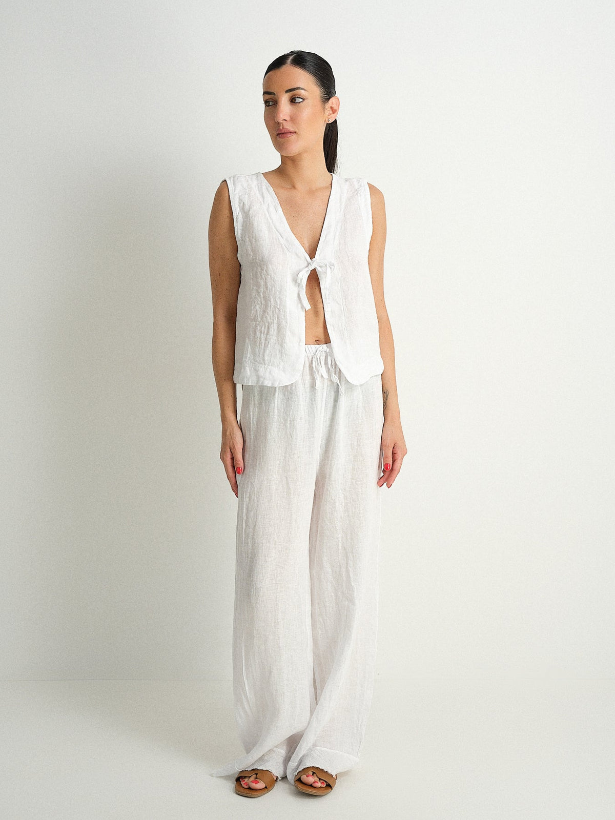 Pantalone in puro lino sfrangiato