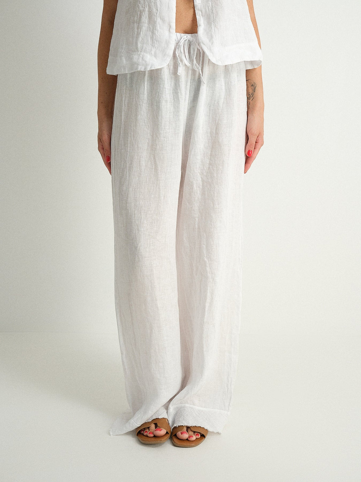 Pantalone in puro lino sfrangiato