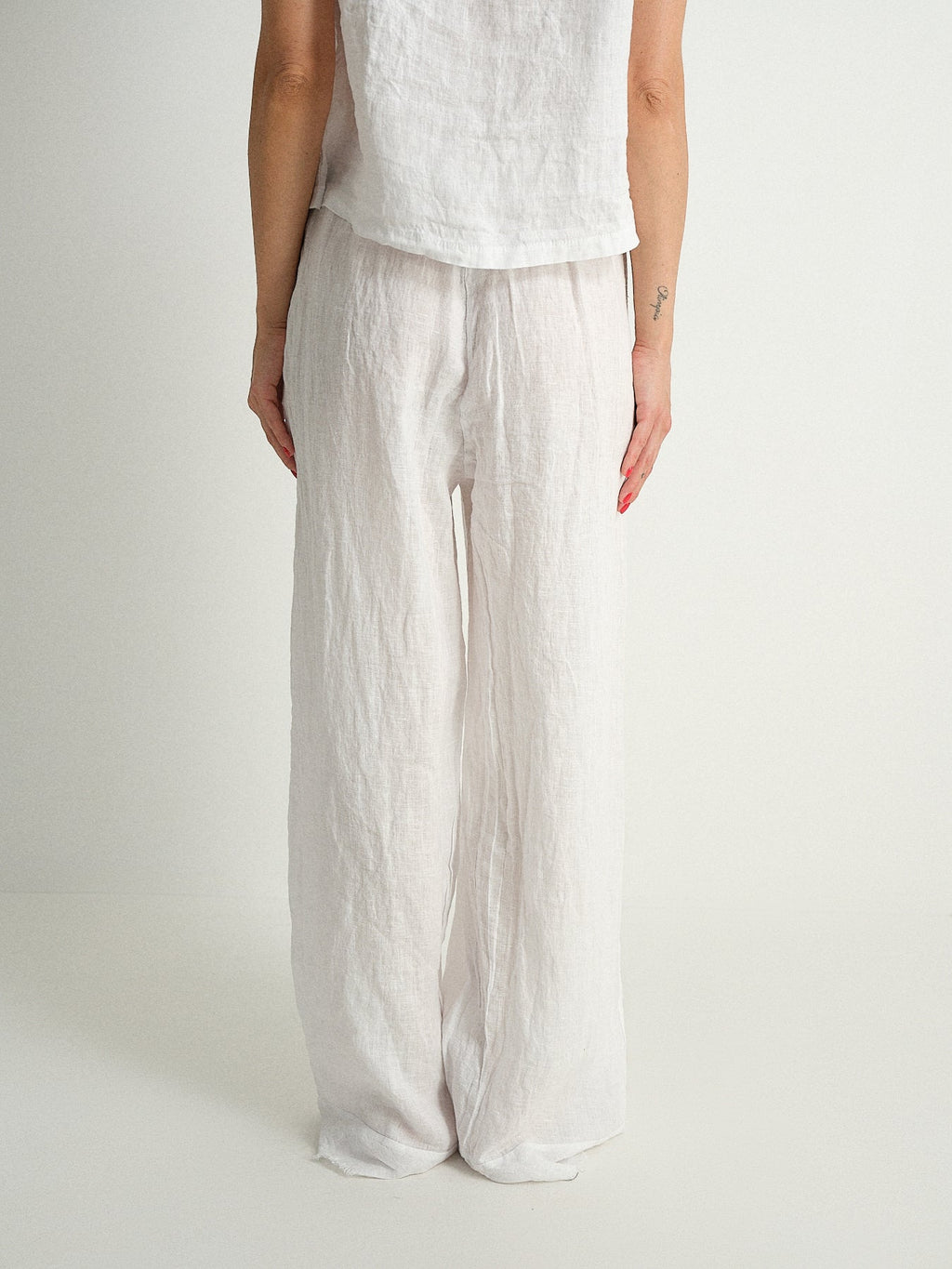 Pantalone in puro lino sfrangiato
