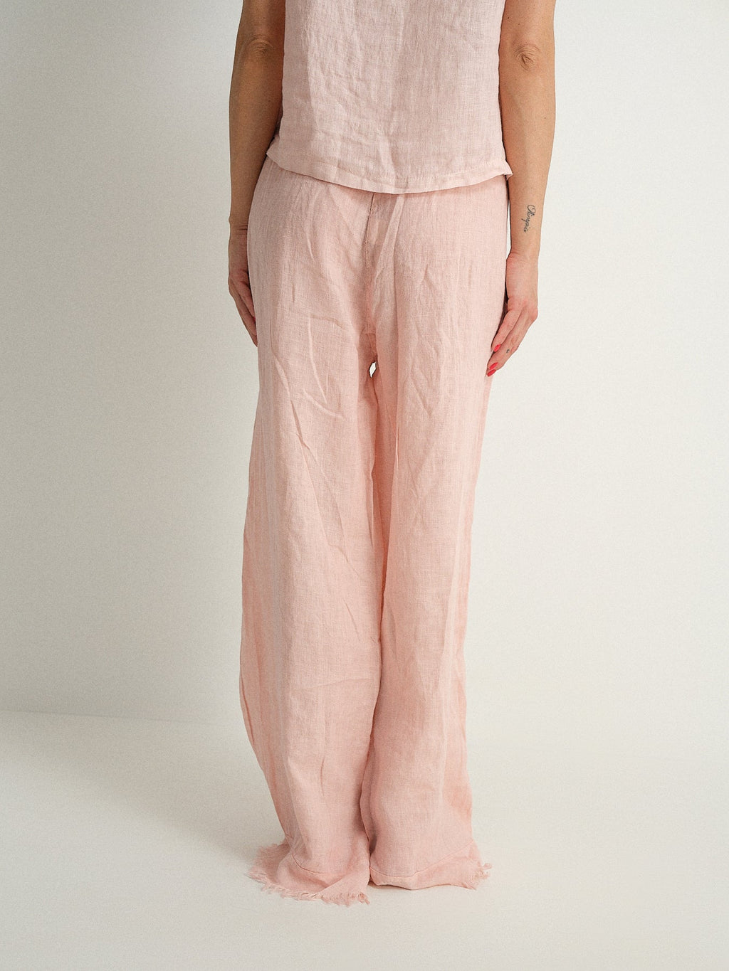 Pantalone in puro lino sfrangiato