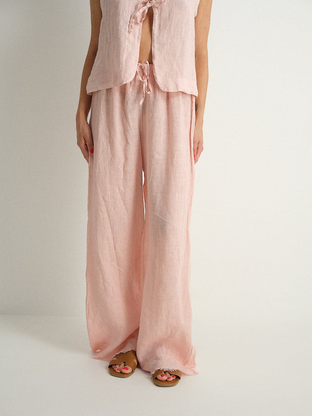 Pantalone in puro lino sfrangiato