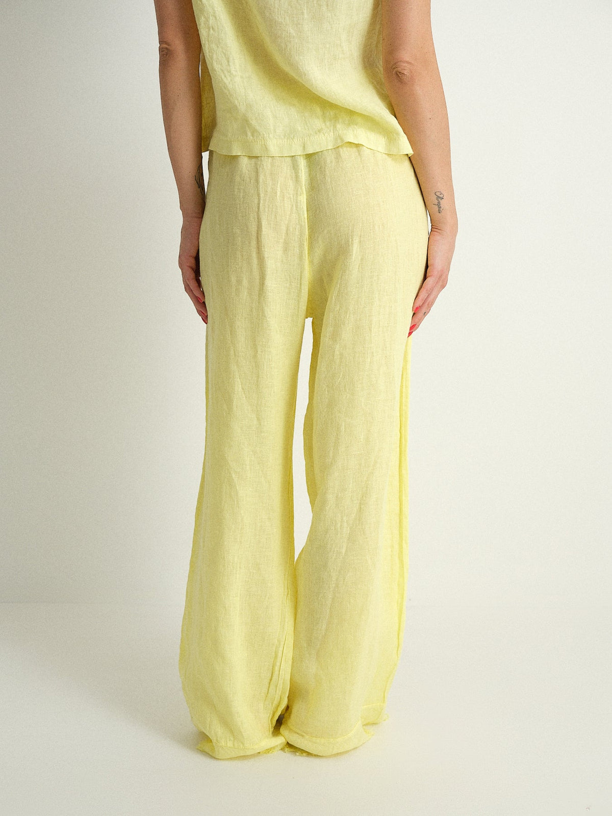 Pantalone in puro lino sfrangiato