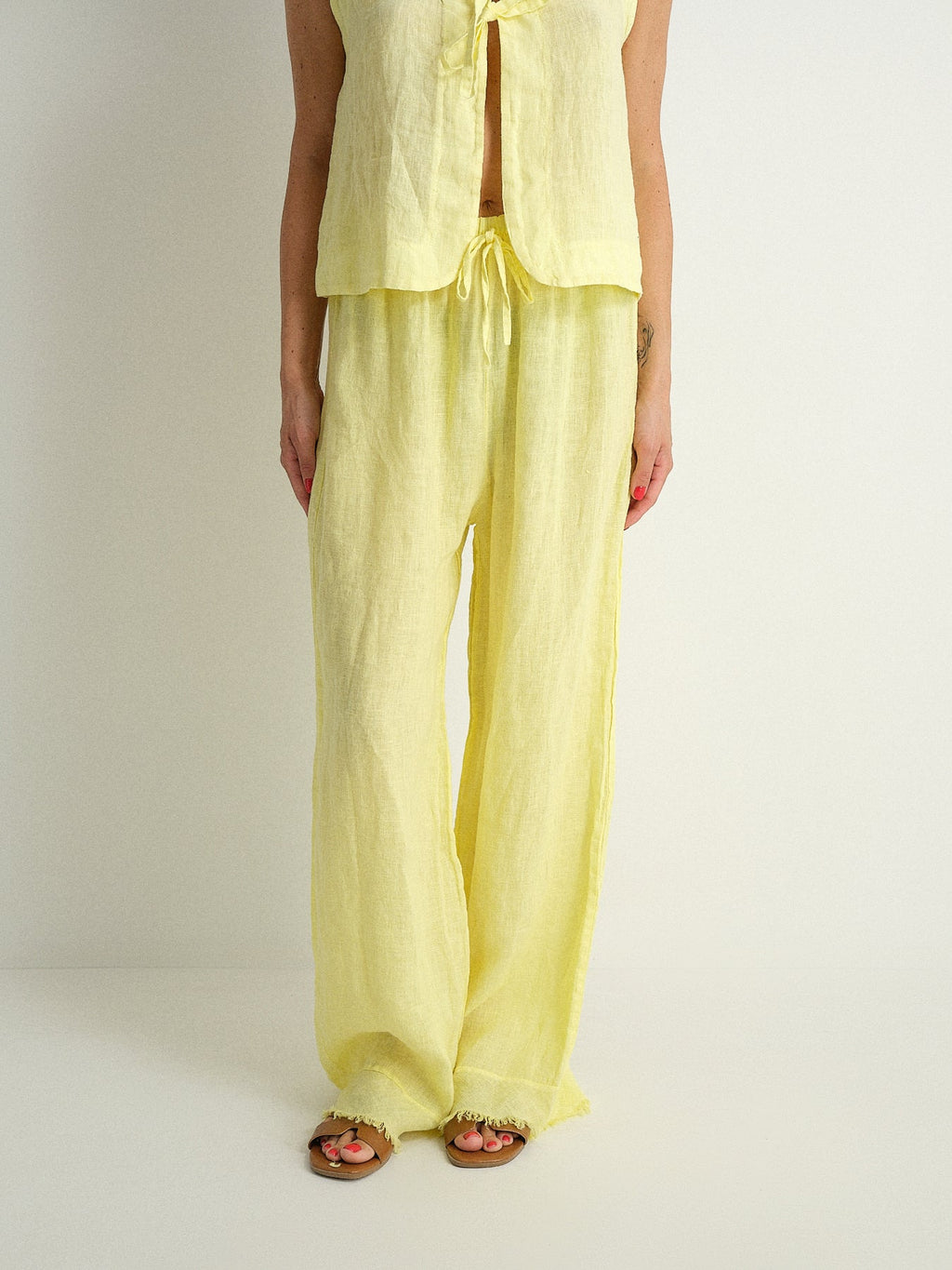 Pantalone in puro lino sfrangiato
